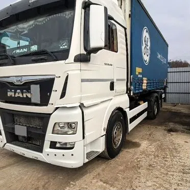Тентованный грузовик 45 м³ MAN TGX 26.440 6x2-2 LL, 2014